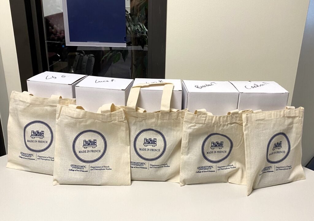 five bags and boxes on table for thesis students